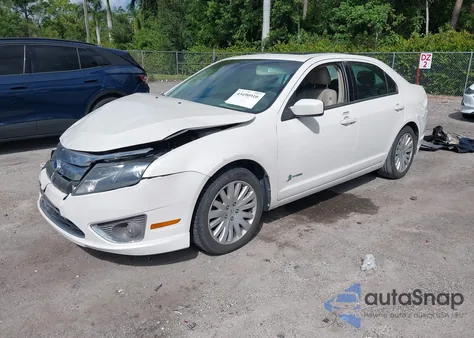 2012 Ford Fusion Hybrid из США, поврежденный, VIN 3FADP0L30CR216282